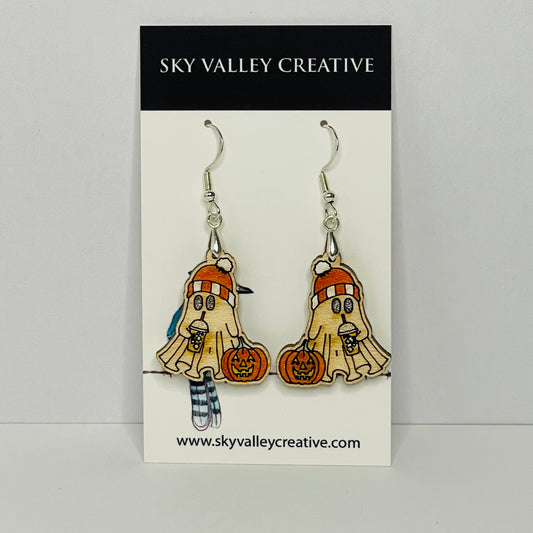 Halloween-themed ghost earrings with pumpkins on a display card with 'Sky Valley Creative' branding.